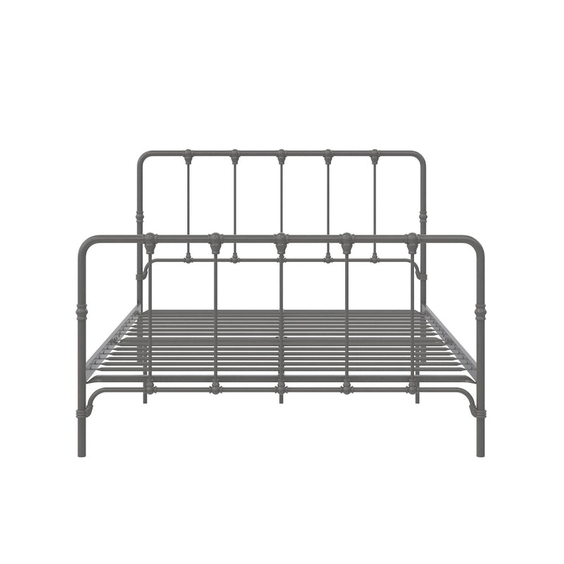 Letto in metallo stile rustico con testiera ricurva e dettagli a pinnacolo vintage