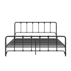 Letto in metallo stile rustico con testiera ricurva e dettagli a pinnacolo vintage
