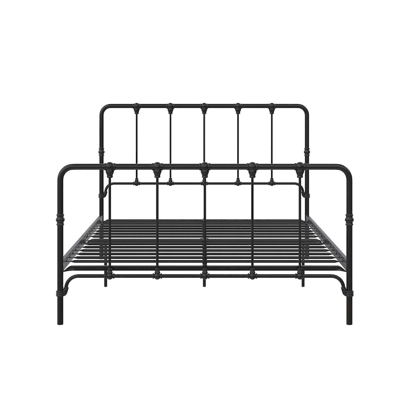 Letto in metallo stile rustico con testiera ricurva e dettagli a pinnacolo vintage